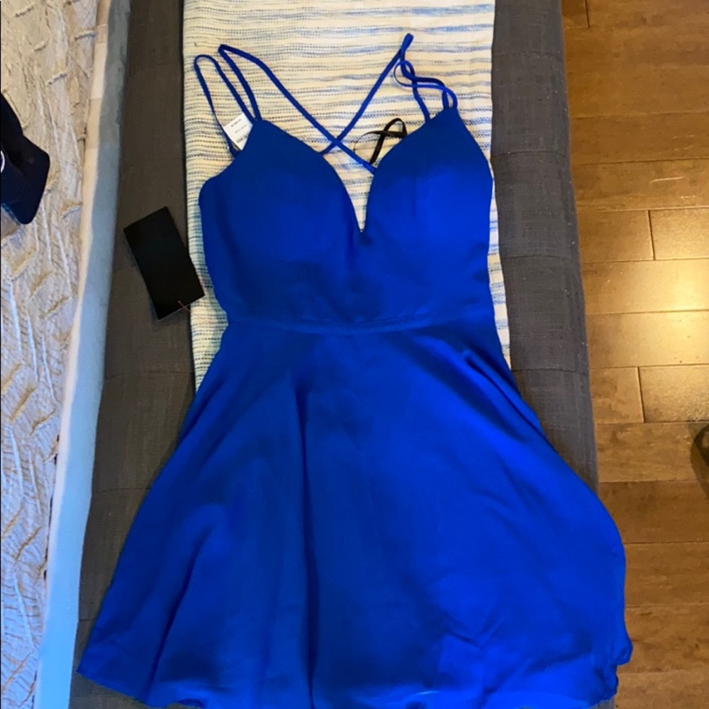 Bebe plunge v neck open cross back mini dress